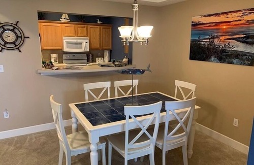 Ludington Condo | 3 Bedroom, 2 Bath Ground Level Condo with Walkout Access to Pool & Courtyard!