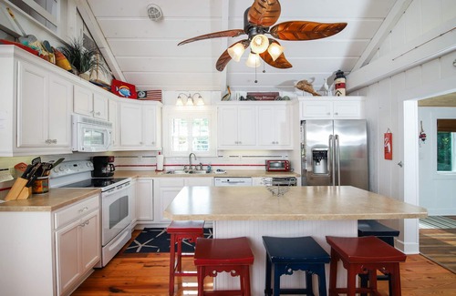 Palm Island House | 3 Bedroom home, private dock, a block to the beach!