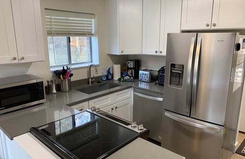 Millcreek House | 3 Bedroom Residential Duplex with carport and private yard