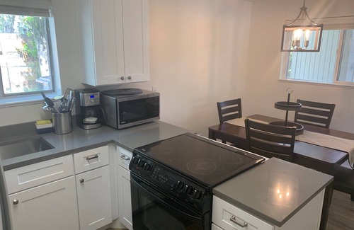 Millcreek House | 3-bedroom residential duplex with carport.