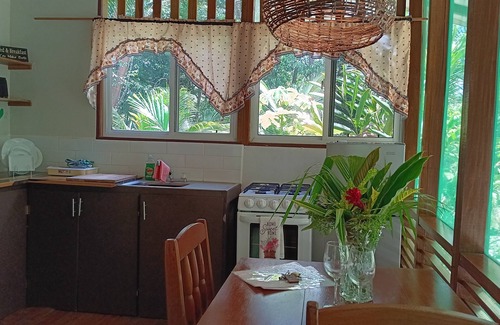San Ignacio House | 3 Family Cottages -7 beds~AC~ Screened balcony~ Breakfast and dinner onsite.