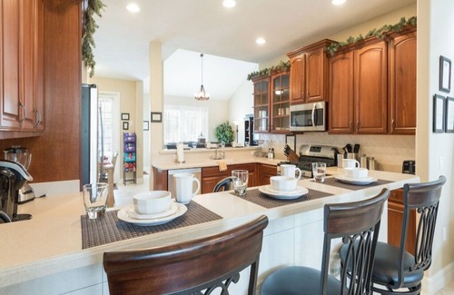 West Kissimmee House | 3 Miles to Disney! Themed Home FREE Heated Pool & Spa Theater Grill & 7 Bedrooms