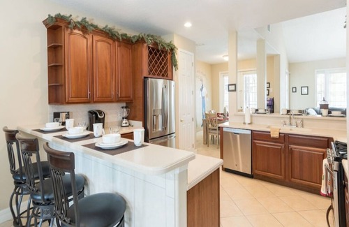 West Kissimmee House | 3 Miles to Disney! Themed Home FREE Heated Pool & Spa Theater Grill & 7 Bedrooms