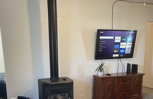 Casper House | 3 mins to Downtown Casper! 2 bedroom Dog Friendly Home w/ fireplace