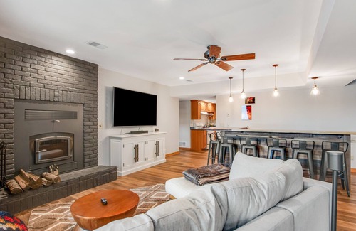 Lac du Flambeau House | 3-story chalet with private hot tub, game room & waters toys - dog-friendly
