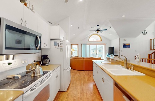 Monteray Shores House | 3-story home with private hot tub, game room, pool access, tennis/basketball