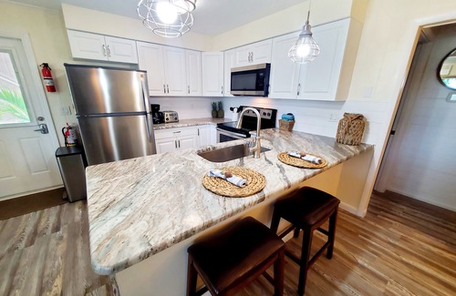 Englewood House | 30 Seconds To Beach Path! Tiki Bar with outdoor TV! Bikes, Kayaks, Sups & more!