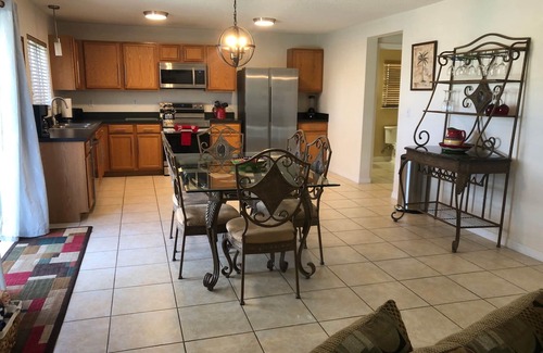 Sunrise Lakes House | 3000 sf fully fenced luxury waterfront home, private pool 15 min. from Disney!