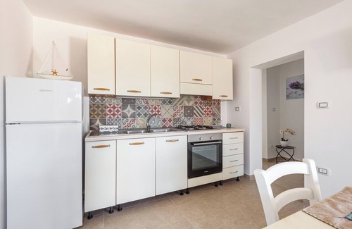 Torre Lapillo Apartment | 3863 Dimora Le Frasche - Trilo 1 by BarbarHouse