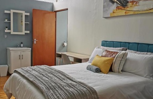 Secunda Apartment | 39A Spacious 2 Bedroom Duplex Apartment