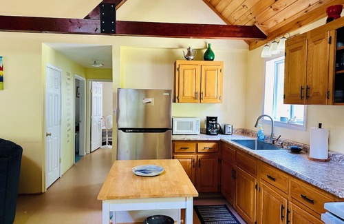Standish House | 3Bd, 1 bath camp on Frye Island close to Beach 6 with screened-in porch!