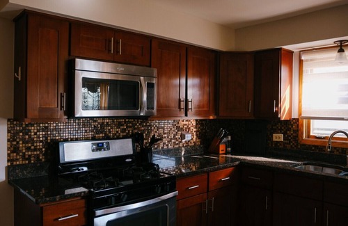 Dunning Apartment | 3BR Oasis, Gym, Workspace, Quiet Location