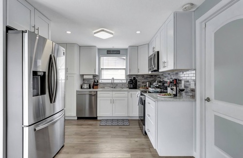 Dunedin House | 3BR Oasis | Sleeps 11 | Heated Pool | Ping Pong!