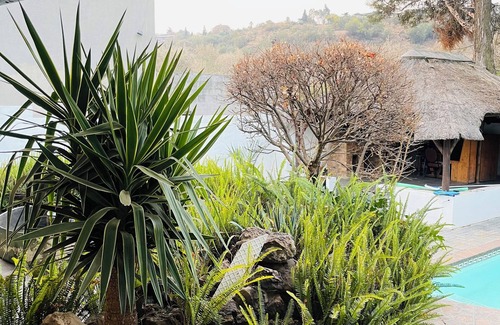 Greater Johannesburg Metropolitan Area House | 4-bedroom house in fabulous Johannesburg South with free WiFi, fitness room