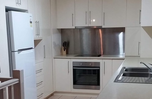 Nambucca Heads House | 4 bedroom house. Walk to Restaurants, River, Beaches, Boat ramp. Deck with view.