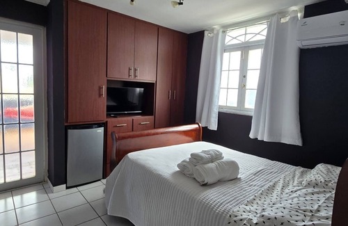 Puerto Nuevo House | 4-bedroom house in welcoming Vega Baja with AC, WiFi