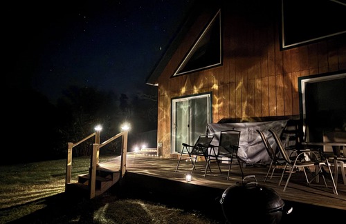 Markville House | 4-bedroom north woods, pet friendly cabin with WiFi, great room and fire place.