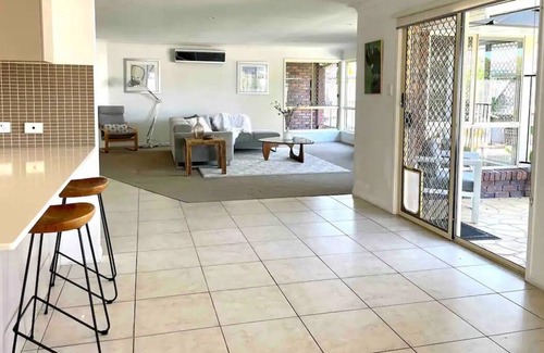 Runaway Bay House | 4 BR Home in Runaway Bay Close to Sports Complex