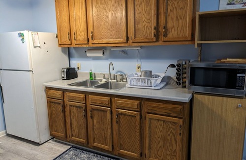 Omaha House | 4 minutes to zoo & 10 minutes to downtown! 2 bedroom, 3 bed home w/patio & yard