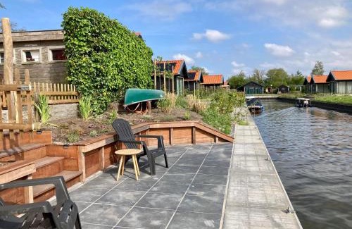 Anjum Ski Chalet | 4 pers house Cecil with own fishing spot on a dutch chanel