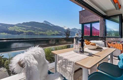 Ingenbohl Apartment | 4 Seasons Apartment I 1-4 Personen I See, Bergsicht I 65' Smart TV, Tischkicker und Badewanne I Parkplatz