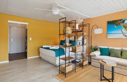 Ingenbohl Apartment | 4 Seasons Apartment I 1-4 Personen I See, Bergsicht I 65' Smart TV, Tischkicker und Badewanne I Parkplatz