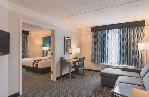 Orlando House | 4 x King Bed Deluxe Suite, Pool View at La Quinta Inn by Wyndham Orlando UCF