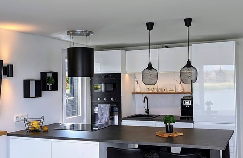 Wangerland Boat Rental | 45 m² houseboat with 40 m² roof terrace, modern furnishings. See photos!