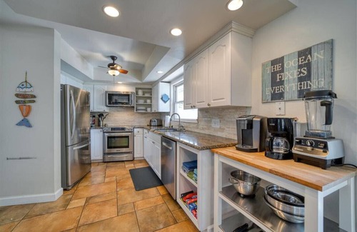 Indian Rocks Beach House | 456 Waterfront w/Dock, 3/Br Home Heated pool with Golf Cart in IRB Sleeps 10