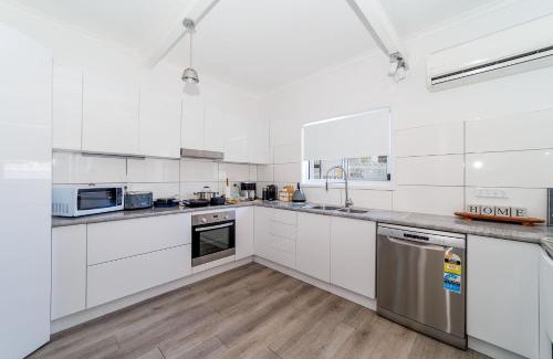 Pialba House | 4BR Coastal Retreat With Pool