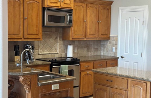 Mission House | 4BR Hacienda Lakeview Retreat: Pool, Fireplace, Piano + Theater Room