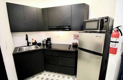 Mayaguez Pueblo Apartment | 5.1 Historic Urban Living w/Parking + Generator