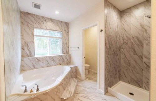Michigan Hill House | 5000sqft W Indoor Hot Tub, Game Room, Views & Private Suite!