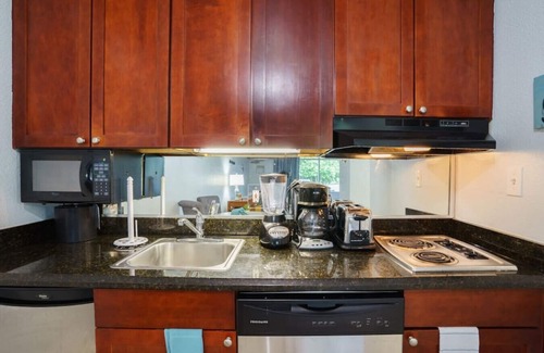 Ruskin Condo | 503- Beach Resort- ground unit steps from pool - restaurant, private beach!