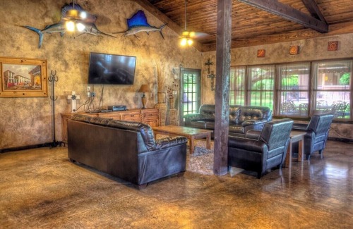 Sabinal Cabin | 6-bedroom Lodge on 12 acres in Concan, Texas. Swimming pool & hot tub.