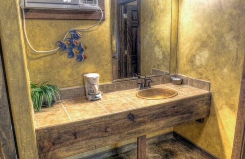 Sabinal Cabin | 6-bedroom Lodge on 12 acres in Concan, Texas. Swimming pool & hot tub.