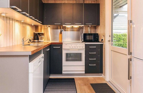 Hasmark Strand House | 6 person holiday home in Otterup