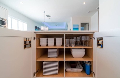 West Bay Condo | 7 Mile Beach Beach Club and Pool Pavilion. Ocean views from Roof Terrace