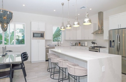 West Bay Condo | 7 Mile Luxury Beach Club. Ocean views from Roof Terrace and Pool Pavilion.