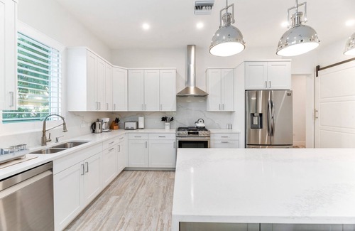 West Bay Condo | 7 Mile Luxury Beach Club. Ocean views from Roof Terrace and Pool Pavilion.