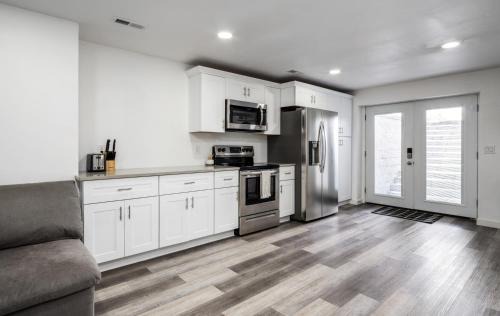 Saratoga Springs House | 8 Beds 2 Full Kitchens Fenced HUGE Yard & Parks!