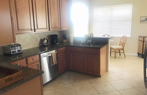 Braden River House | 8304-102 Gorgeous golf and lake view coach home next to pool