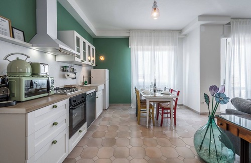 Old Town Apartment | [A BALCONY OVER THE ROOFTOPS OF MODENA] FROM THE BRUNETTE