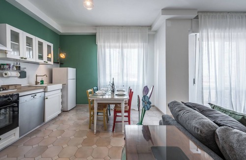 Old Town Apartment | [A BALCONY OVER THE ROOFTOPS OF MODENA] FROM THE BRUNETTE