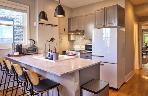 Logan Square Apartment | A chic second-floor plant-filled retreat in Chicago's Logan Square neighborhood.