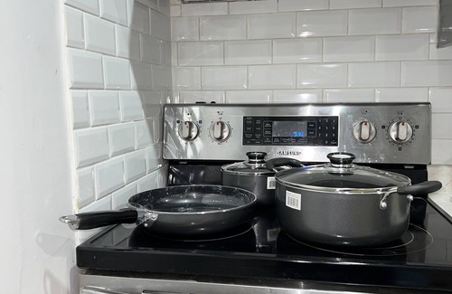 West Hill House | A cozy fully furnished apartment. Sleeps six. Close to all amenities.