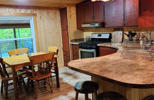 Inlet House | A cozy, pristine family retreat located in the town of Inlet.