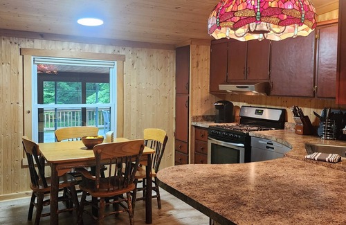 Inlet House | A cozy, pristine family retreat located in the town of Inlet.