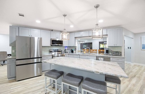 Fort Myers Shores House | A Forest Pool Calloosahatchee River Retreat