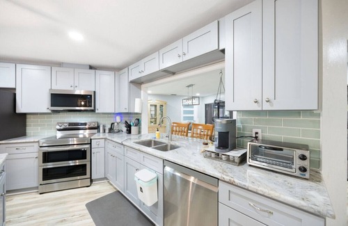 Fort Myers Shores House | A Forest Pool Calloosahatchee River Retreat